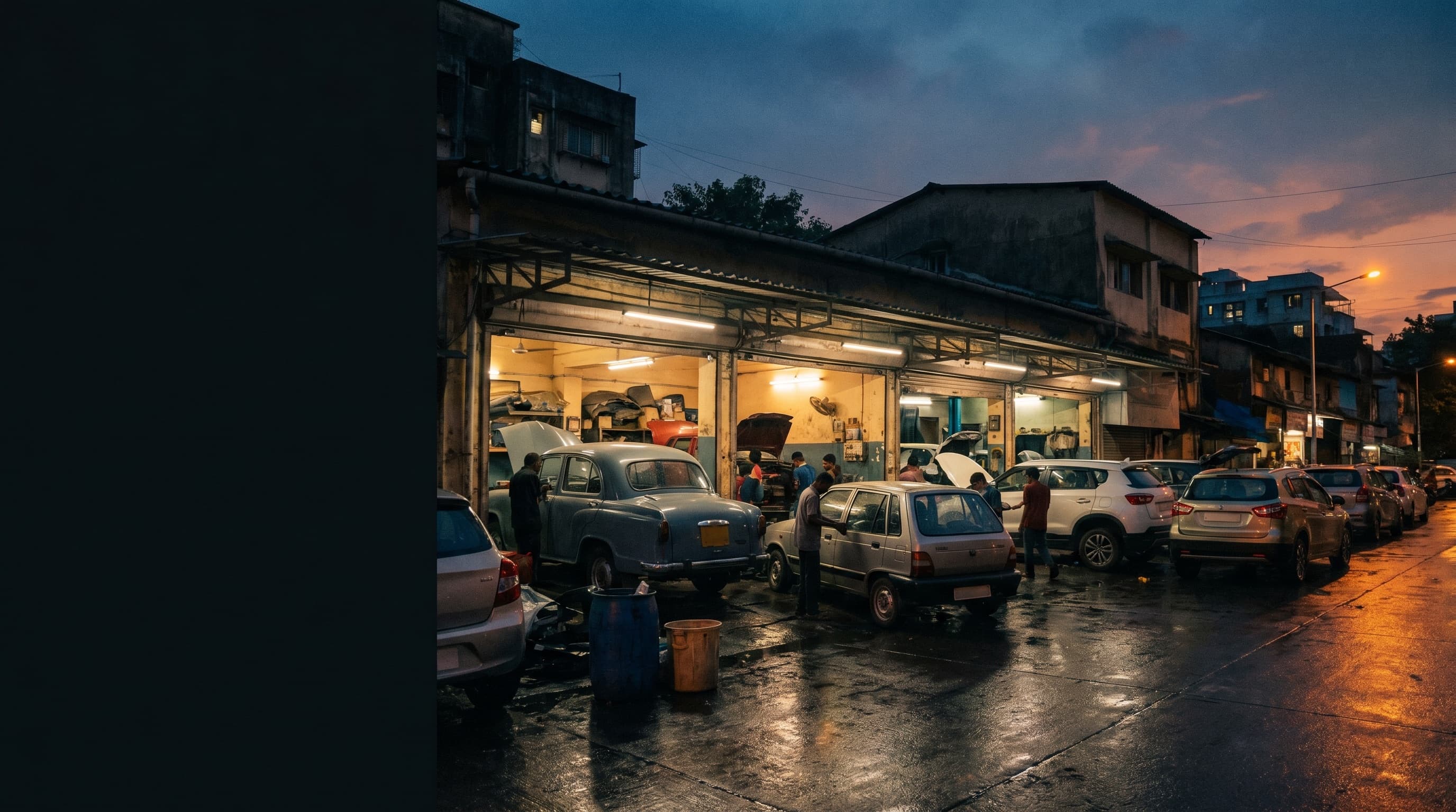 Wide view of a busy independent workshop at dusk